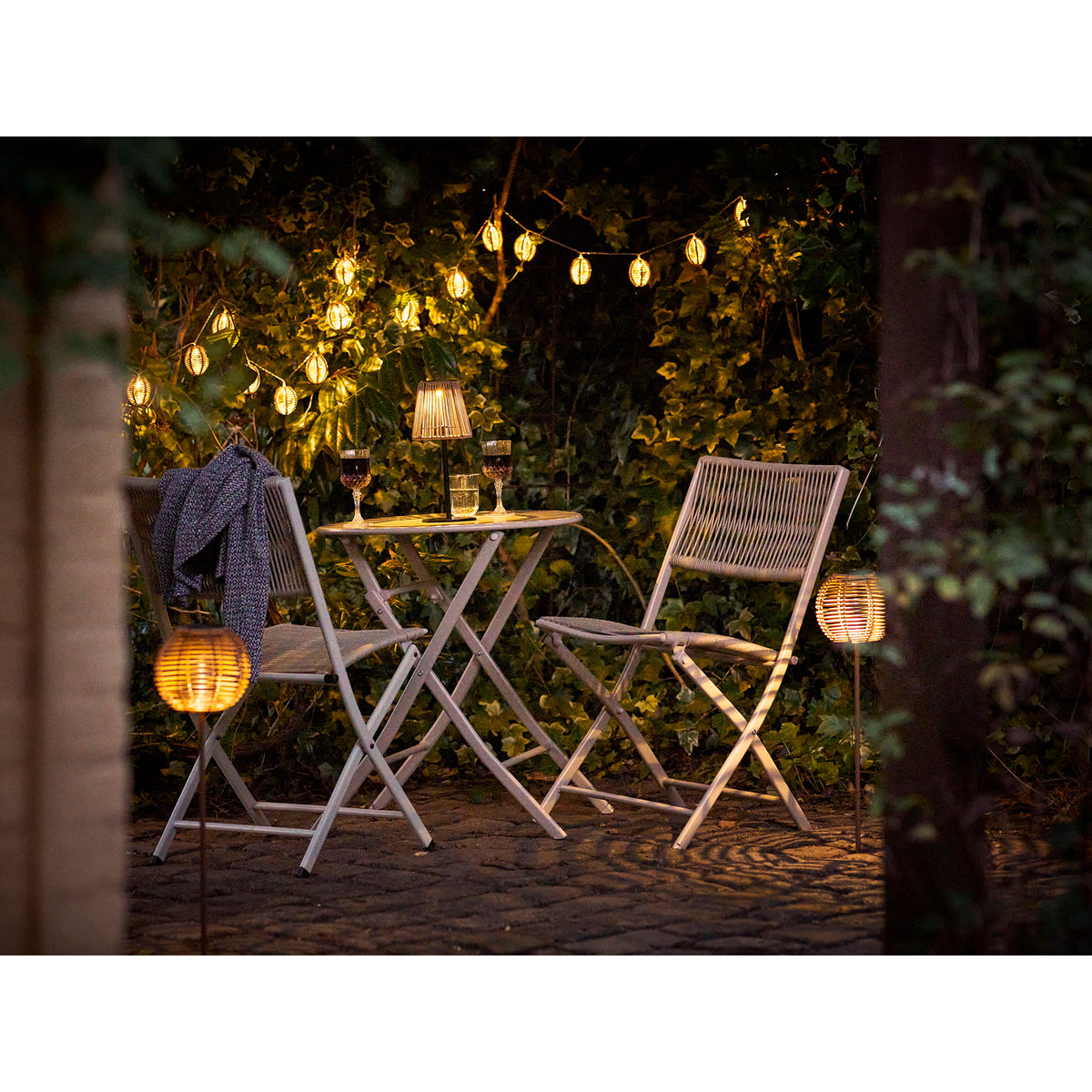 Carlisle LED String Light - Lichtsnoer, polyrattan/metaal, naturel/zwart